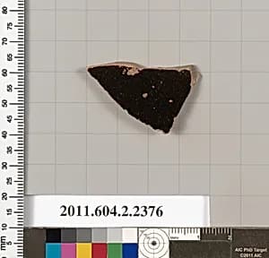 Terracotta fragment of a lid by Unknown Artist