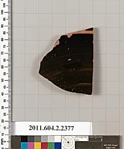 Terracotta fragment of a lid by Unknown Artist