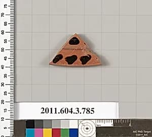 Terracotta fragment of a lid  by Unknown Artist