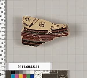 Terracotta fragment of a lid by Unknown Artist