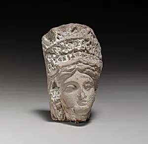 Terracotta head of a goddess by Unknown Artist