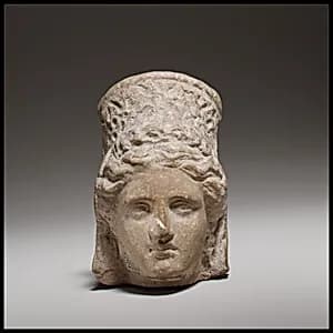 Terracotta head of a goddess by Unknown Artist