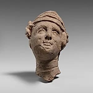 Terracotta head of a woman by Unknown Artist