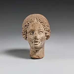 Terracotta head of a woman by Unknown Artist
