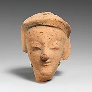 Terracotta head of a woman by Unknown Artist