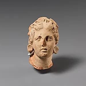 Terracotta head of a woman by Unknown Artist