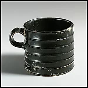 Terracotta mug with horizontal rills by Unknown Artist