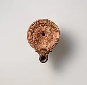 Terracotta oil lamp by Unknown Artist