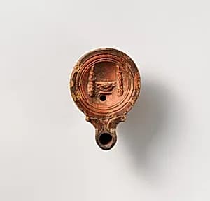 Terracotta oil lamp by Unknown Artist