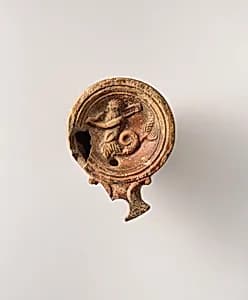 Terracotta oil lamp by Unknown Artist