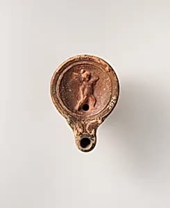 Terracotta oil lamp by Unknown Artist