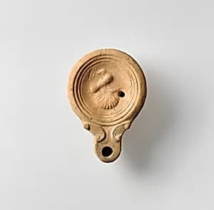 Terracotta oil lamp by Unknown Artist