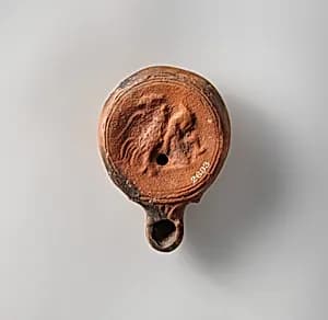 Terracotta oil lamp by Unknown Artist