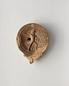 Terracotta oil lamp by Unknown Artist