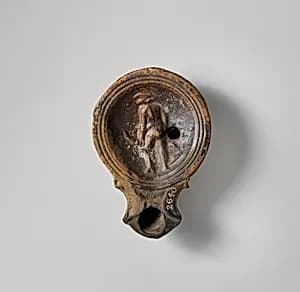 Terracotta oil lamp by Unknown Artist