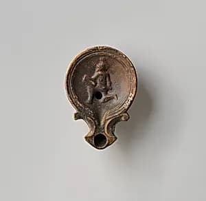 Terracotta oil lamp by Unknown Artist