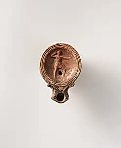 Terracotta oil lamp by Unknown Artist