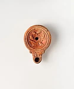 Terracotta oil lamp by Unknown Artist