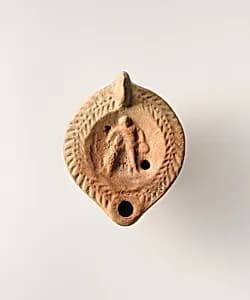 Terracotta oil lamp by Unknown Artist