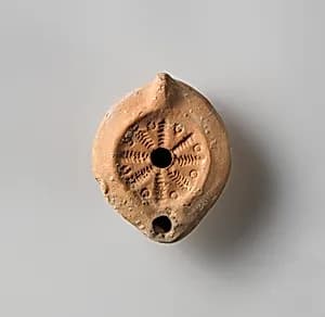 Terracotta oil lamp by Unknown Artist