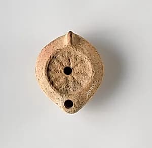 Terracotta oil lamp by Unknown Artist
