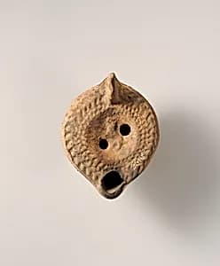 Terracotta oil lamp by Unknown Artist