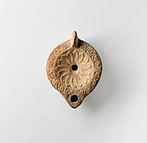 Terracotta oil lamp by Unknown Artist