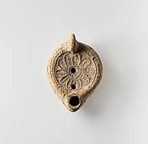 Terracotta oil lamp by Unknown Artist