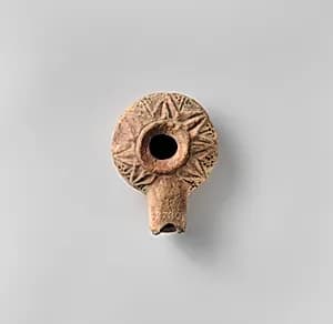 Terracotta oil lamp by Unknown Artist