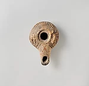 Terracotta oil lamp by Unknown Artist