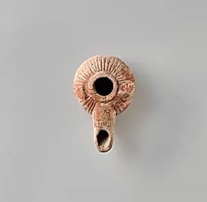 Terracotta oil lamp by Unknown Artist