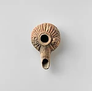 Terracotta oil lamp by Unknown Artist