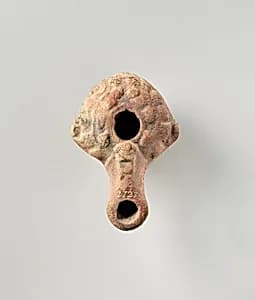 Terracotta oil lamp by Unknown Artist