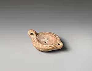 Terracotta oil lamp by Unknown Artist
