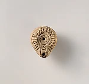 Terracotta oil lamp by Unknown Artist
