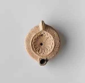 Terracotta oil lamp by Unknown Artist
