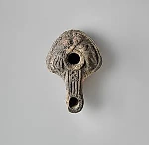 Terracotta oil lamp by Unknown Artist