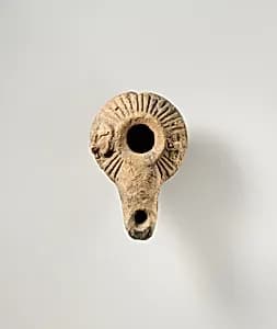 Terracotta oil lamp by Unknown Artist