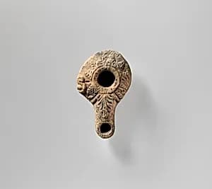 Terracotta oil lamp by Unknown Artist