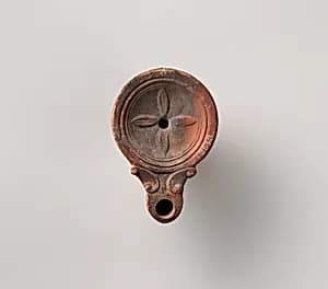 Terracotta oil lamp by Unknown Artist