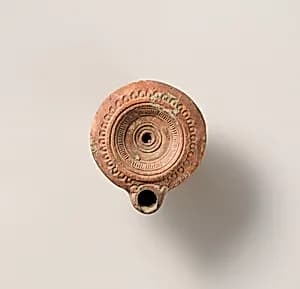 Terracotta oil lamp by Unknown Artist