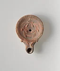 Terracotta oil lamp by Unknown Artist
