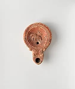 Terracotta oil lamp by Unknown Artist