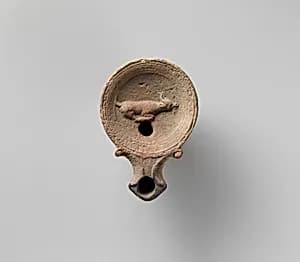 Terracotta oil lamp by Unknown Artist