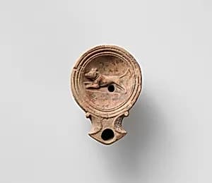 Terracotta oil lamp by Unknown Artist