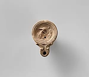 Terracotta oil lamp by Unknown Artist