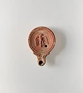 Terracotta oil lamp by Unknown Artist