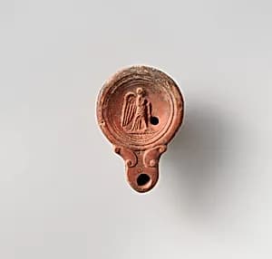 Terracotta oil lamp by Unknown Artist