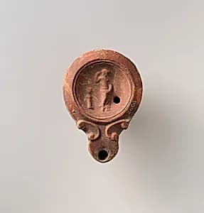 Terracotta oil lamp by Unknown Artist