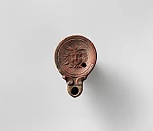 Terracotta oil lamp by Unknown Artist